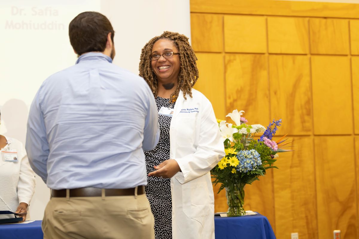 Student accepting an award at the 2023 Honors and Awards Ceremony